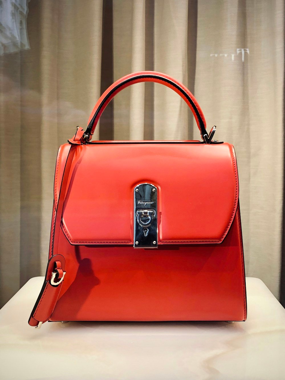 Luxury handbag representing the Fashion Fights Cancer donation program